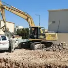 هدم وتكسير المباني بالمقابل