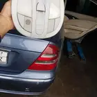 قطع مرسيدس E 2004 نظيفة جدا .طابلون ساعات. مراية سقف.نور سقف