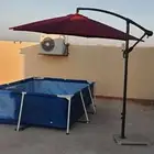 مسبح مع غطاء وفلتر ومظلة مع ستاتد رخام