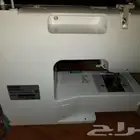 مكينة خياطة مع بطانية