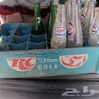 صندوق قوارير كولا وسفن قديم