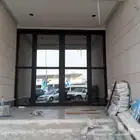 ابواب المينوم شبابيك مظلات ابواب حديد