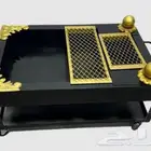 منقل حطب منقوش أسود بذهبي بكفرات