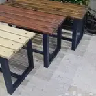 كرسي خشبي قاعده حديد وطاوله