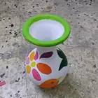 رسم علي الأواني الفخاريه والاحجار وجميع انواع الرسم