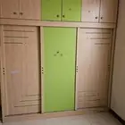 غرفه أطفال اثنين سرير ودولاب كبير