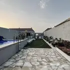شاليه بمسبحين وألعاب اطفال وغرفة نوم حي الرمال