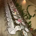 طاولات عشاء الحفلات والمناسبات