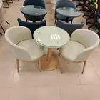 كرسيين وطاوله كافي