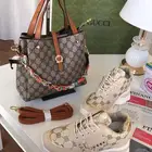 طقم نسائي من قوتشي