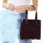 شنطة ماركة تيد بيكر tedbaker أصلية مع ( مق ) تيدبيكر