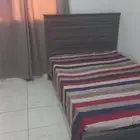 Two queen wooden beds