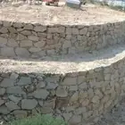 بناي حجر كبير وسواق بوكلين العنوان مكه