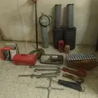 اغراض بوكلين فلاتر وطرمباومفاتيح ومشاحم ودبه غاز دقاق مليانه