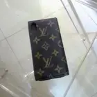 LV I PHONE XS ORIGINAL.MADE IN FRANCE جديد.