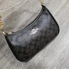 شنطة كوتش لون بني جديده طبق الاصل تماما