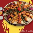 مطعم مشويات ومقبلات ورز وبيتزه