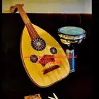 بكج موسيقى مكون من( عود موسيقي لتعليم  مرواس ايقاع سوري)