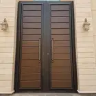 دهان ابواب حديد وخشب نراي زيتي