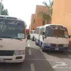 Rental bus with drivers