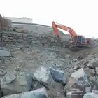 لبنيان الحجر وقص الاراضي