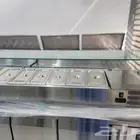 برادة سلطات فوق الطاولة
