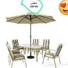 جمله وقطاعي كراسي وترابيز خارجيه معا المضلات رذاذ