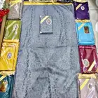 مصحف مع سجادة