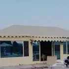 بيوت شعر ملكي مظلات سيارات سواتر هناجر برجولات لكسان