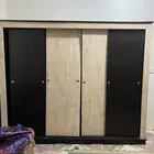 دولاب ملابس خشب اربع ابواب على الشرط رف واحد يبيله قاعده