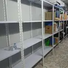 رفوف محلات بقالات صيدليات مستودعات