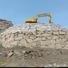 بوكلين لبناء الحجر وقص الاراضي وهدم العمائر القديمه