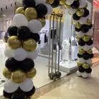 تنسيق بلالين افتتاح معرض الأزياء