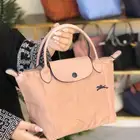 شنطة ماركة لاكوست