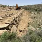 بناء جدار حجر بوكلين