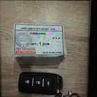 كورولا جهاز و ريموت سنتر لوك كامل اصلي جديد وكالة2013