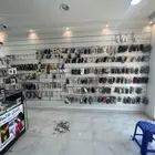 بضاعة محل جوالات تصفية