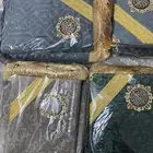 مصحف مع سجادة
