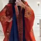 عبايه برتقاليه من ثري لاينز