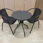 كرسيين وطاولة خارجي