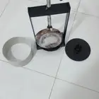 مكبس تمر يدوي