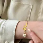 أسواره نسائيه بالاسم مع ورده بشكل أنيق