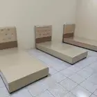 سرير خشب جلد