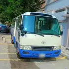 Toyota Coaster for rent with a driver on a monthly basis