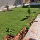 م ابو احمد تنسيق حدائق وتركيب جميع انواع الثيل الصناعى والطب