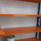 يوجد لدينا رفوف مستودعات وبقالات بجميع انواعها