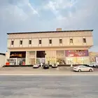 عمارة شقق عزاب للايجار و محلات _حي الحمدانية الفروسية