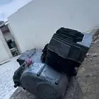 مكينه دباب ax100