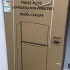 ثلاجه جديده بكرتونه