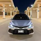 كامري V6 قراندي 2023 فضي وكالة